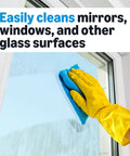 Gloved hand using Streak Free Glass Cleaner For Mirrors And Windows, 32 Fl Oz Bottles, Pack Of 2 to wipe window clean.