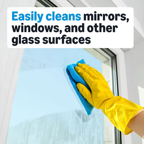 Gloved hand using Streak Free Glass Cleaner For Mirrors And Windows, 32 Fl Oz Bottles, Pack Of 2 to wipe window clean.