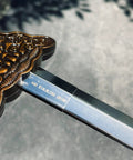 Close-up of 36 Inch Tai Chi Training Sword With Retractable Design For Indoor And Outdoor Practice showing blade details
