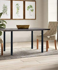 Room with dining table featuring 28 Inch Square Adjustable Metal Table Legs With Leveling Feet, Set Of 4, Black Finish.