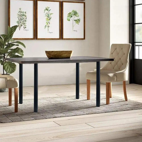 Room with dining table featuring 28 Inch Square Adjustable Metal Table Legs With Leveling Feet, Set Of 4, Black Finish.