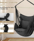 Chill Macrame Hammock Chair With Two Cushions For Indoor Outdoor Use Hanging Rope Swing Chair Supports Up To 350 Lbs Anti Slip Spreader Bar And Pocket Black, displaying enhanced stability and support in a room with tightly woven ropes and anti-slip stoppers.