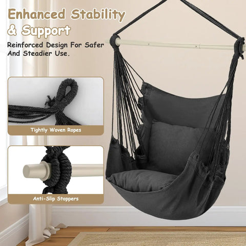 Chill Macrame Hammock Chair With Two Cushions For Indoor Outdoor Use Hanging Rope Swing Chair Supports Up To 350 Lbs Anti Slip Spreader Bar And Pocket Black, displaying enhanced stability and support in a room with tightly woven ropes and anti-slip stoppers.