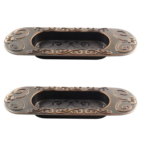 Two Pack 4.13 Inch European Recessed Flush Pull Handle Set In Stainless Steel With Antique Copper Finish For Cabinets Closets Dressers And Drawers Inset Sliding Door Handle Modern Vintage Style Rust Resistant. Front view of decorative flush pull handles with antique copper design.