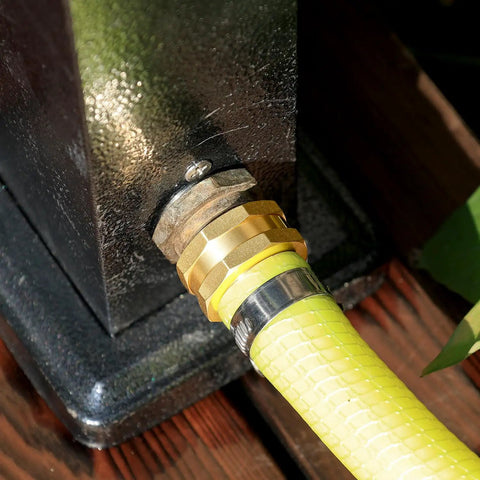 Female Garden Hose End Repair Connector With Clamps Fits Three Quarter And Five Eighths Inch Brass Hose Fittings in use on yellow hose