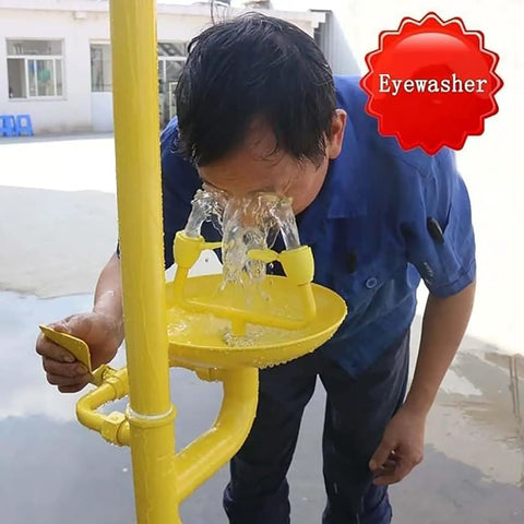 Person using Must Have Emergency Eye Wash And Shower Station For Lab Safety with dual spray eyewasher and push plate.
