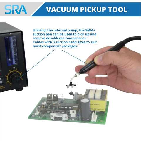 Hand using 4 In 1 SMD Hot Air Rework Station vacuum pickup tool to lift IC component from circuit board.