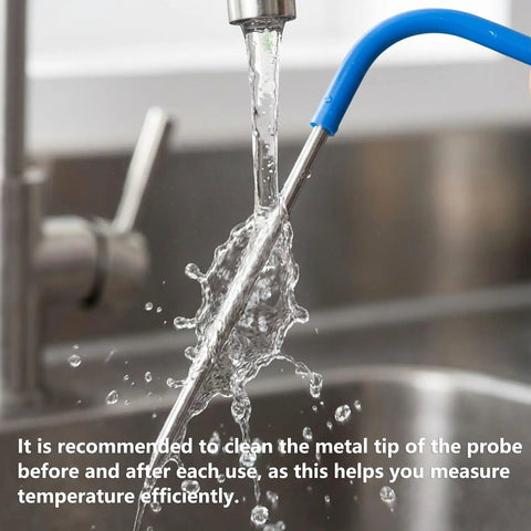 Washing upgraded 2 pack meat probes for pellet grills with 3.5mm plug under faucet for cleanliness.