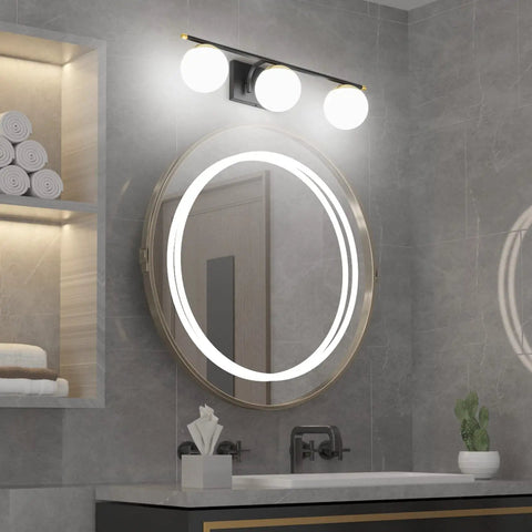 Three Light Mid Century Modern Vanity Light With Sleek Dope Black And Gold Finish And Milky Glass For Bathroom installed above round mirror