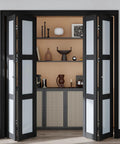 Black Bifold Closet Doors For A 72 By 80 Inch Opening featuring frosted glass panels and hidden track system, ideal for pantry or laundry.