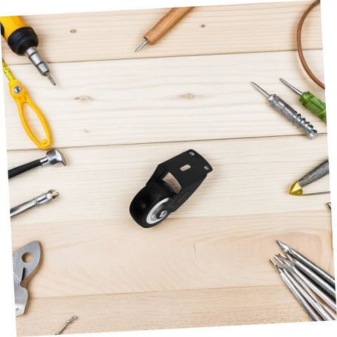 Heavy Duty Folding Barn Door Hardware Kit With Silent Bearing Casters Runs Dead Quiet Sliding Roller System For Closet Wardrobe, black caster wheel on wooden surface.