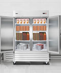 Heavy Duty Stainless Steel Upright Freezer 54 Inches Wide 44 Cubic Feet stocked with frozen meats and desserts.