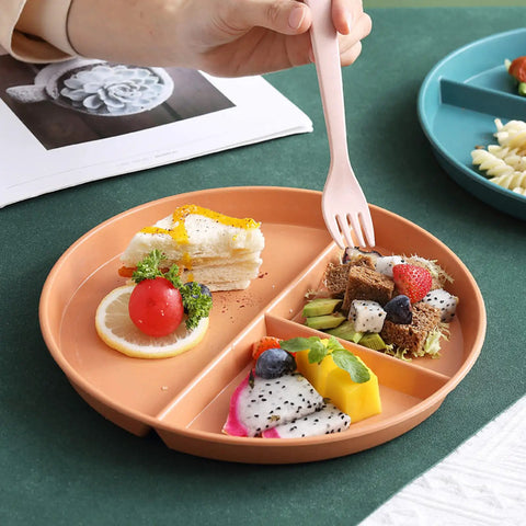 Portion Control 2 Pack 9 Inch Unbreakable Divided Plates With 3 Compartments For Easy Weight Loss And Balanced Meals Reusable Dinner Plates For Adults Black, shown with assorted fruits and desserts.