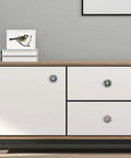 White cabinet with Handmade Flower Ceramic Knob Set of 10 with Colorful Multi Design Cabinet Knobs for Doors Drawers Cabinets Ideal for Home Kitchen Office Includes Wrench Screws Caps and Bolts.