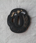 Close-up of samurai sword koshirae with tsuba alloy 081-099 black finish two girl motif detailed design