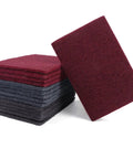 Stack of scuff pads from 15 Piece Scuff Pad Kit For Auto Body Work General Fine And Ultra Fine Manual Scrubbin Pads For Metal Car Paint Scratch Repair Sanding Polishing Finishing And Easy Reusable Cleaning, size 6x9 inches, showing different grits and colors.