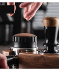 Premium Coffee Distributor And Tamper Leveler For Home Baristas with a wood top and rounded edges suitable for 51mm 58mm portafilters.