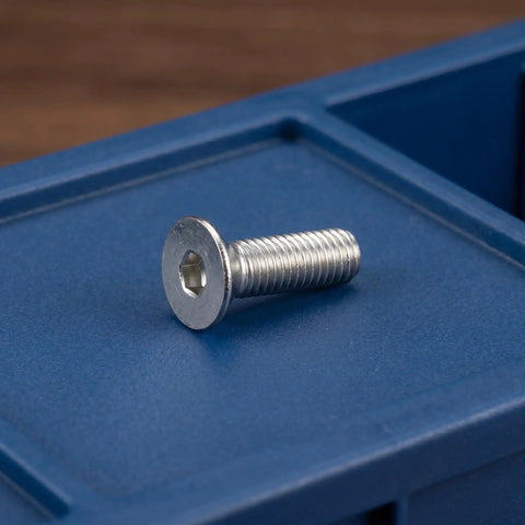 10 Piece Stainless Steel M8x60mm Full Thread Flat Head Screws With Hex Socket on blue surface, countersunk machine fastener.