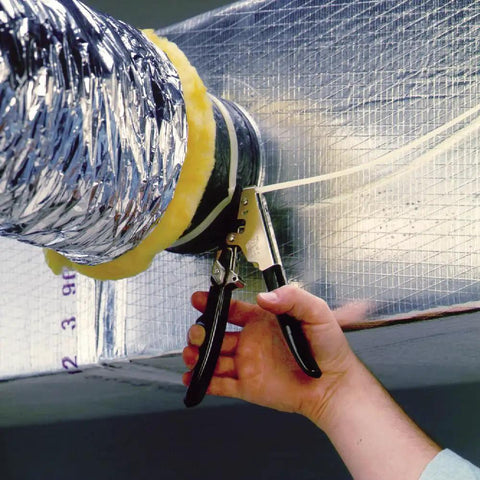 Hand using HVAC Flex Duct Cable Tie Tensioning Tool with Auto Cut Off and Adjustable Tension Knob on duct connection.