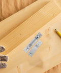 Heavy Duty Stainless Steel Pivot Door Hinges For Cabinets And Windows, 180-Degree Opening next to wooden board and pencil