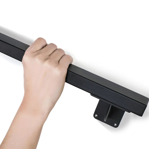 Hand gripping a Heavy Duty 24 Inch Steel Stair Handrail Wall Mount Square Pipe Grab Bar For Indoor Outdoor Steps Deck Porch.