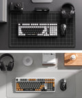 Hella Smooth Silent Mechanical Gaming Keyboard With Rotary Knob Tri Mode Wireless Hot Swappable Gasket Mount Pre Lubed Linear Switches on a stylish desk setup.