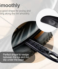 Ultra Strong Bicycle Tire Levers Set, Grab And Go 6 Piece Snap Together Bike Tire Tools in use, sliding along a bike rim.