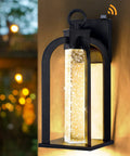 LED Dusk To Dawn Outdoor Wall Light With 14 Inch Black Lantern Style Crystal Bubble Glass Photocell Sensor IP65 Waterproof And Rust Resistant No Fuss Exterior Fixture For House Garage And Porch illuminated at dusk on a wall