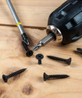 420 Piece Wood Screws Kit Set For Woodworking And Home Repair Black Carbon Steel Self Tapping Screws scattered on wood