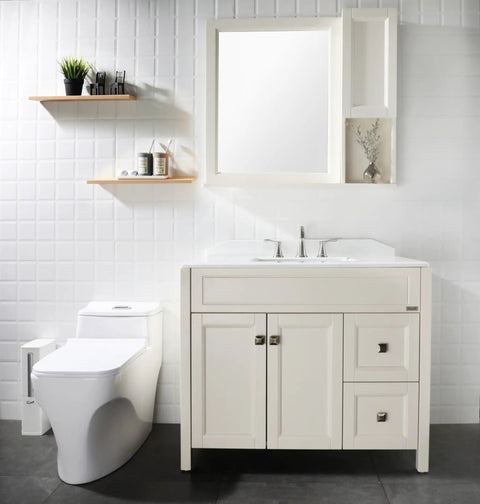 Modern bathroom with vanity, mirror, and widespread two handle faucet with pop up drain and cUPC supply lines in brushed nickel