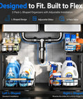 Top Tier Double Slide Out Under Sink Organizers Two Pack Black Steel Pull Out Shelves With Splash Resistant Mat Straight Up Kitchen Cabinet Organization Solution with l-shaped design featuring bottles and cleaners.