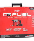 One Inch Sds Plus Brushless Rotary Hammer Cordless Kit Featuring Dual Six Ah Batteries And Fast Charger in protective case.