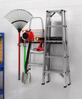 Garage Storage Wall Mount Organizer With 6 Tool Hooks And 2 Shelves holding tools and ladder, 32 inch heavy duty rack on white wall