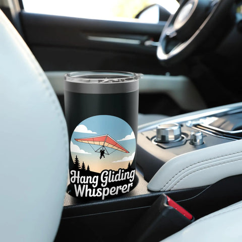 Hang Glider Whisperer Stainless Steel Insulated Tumbler with bold hang gliding artwork in car cupholder, 20 oz size.