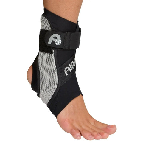 Mild Support Ankle Brace with Dual Side Stabilizers at 60 Degree Guard for sprain prevention, breathable comfort sleeve, slip-on fit.