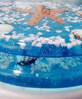 Heavy Duty Resin Toilet Seat With Lid Boasting Vivid 3D Ocean Details And Smooth Shell Motifs Soft Close Bath Accessory close-up of starfish and shells