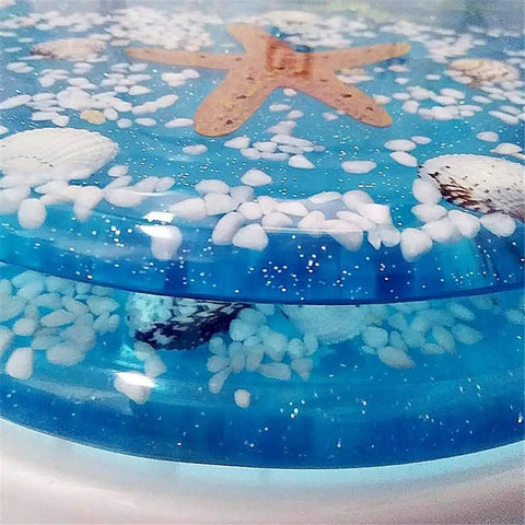 Heavy Duty Resin Toilet Seat With Lid Boasting Vivid 3D Ocean Details And Smooth Shell Motifs Soft Close Bath Accessory close-up of starfish and shells