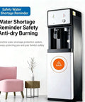 Freestanding Floor Loading Water Cooler With Instant Ice Cold And Piping Hot Settings Smooth Push Button Operation with safety reminder.