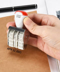 Slick 1.5 Inch Rubber Line Dater Stamp Featuring Quick Twist Dial Calendar in use, stamping date APR 11 2021 on paper.