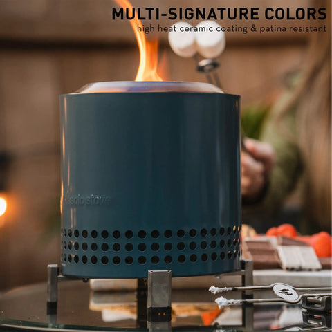 Tabletop Smokeless Fire Pit With Stand 7 Inch Stainless Steel Bonfire For Camping And Patio Wood Or Pellet Fueled Portable Fire Pit Lightweight At Only 2.3 Lbs. on glass surface with marshmallows.