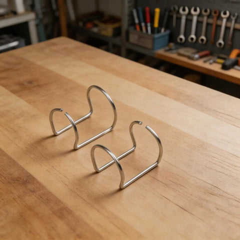 Top 24-Piece Plasma Cutter Consumables Kit For SG-55 AG-60 WSD-60 Nozzles Electrodes Shields Guides shown on wooden table.