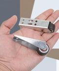Two Pack Low Profile Rubber Casters Smooth Roll Door Support Wheels Side Mount Furniture Gliders in hand, showing steel frame.