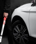 Person holding Flex Head Split Beam Torque Wrench With Easy Knob Dial Heavy Duty Clockwise Torque next to car wheel