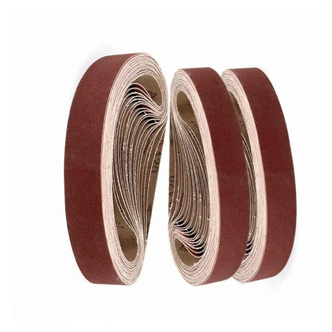 Professional 1X30 Sanding Belts Aluminum Oxide Abrasive Strips stacked, ideal for wet and dry grinding on wood and metal.