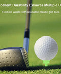 Golf club striking ball on Durable Neon Green 0.82 Inch Golf Tees Pack Of 100 For Easy Tee Up, Short Tees With Thick Body For Stability