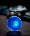 Close-up of Blue Rubber Ball Watch Case Back Opener For Battery Replacement, Non-Marking Friction Ball Tool on a table