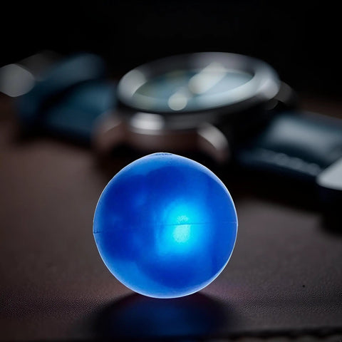 Close-up of Blue Rubber Ball Watch Case Back Opener For Battery Replacement, Non-Marking Friction Ball Tool on a table