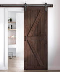 32 Inch By 84 Inch Brown Spruce Wood Barn Door With 5.5 Foot Hardware Track Kit Included Double Surface Easy Assembly K Frame Coffee Finish Sliding Barn Door For Modern Homes And Studios installed in doorway