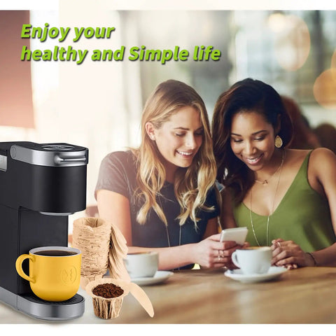 Women enjoying coffee made with Unbleached K Cup Disposable Paper Filters With Lid For Reusable K Cup Pods by a single serve coffee maker