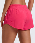 Rear view of Low Waisted Running Shorts 2.5 Inch Inseam In Lip Gloss Pink With Built-In Mesh Liner, Friction-Reducing material